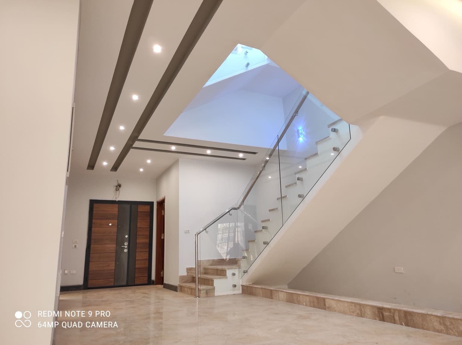 Moisture-resistant gypsum board installation in utility room with proper vapor barriers