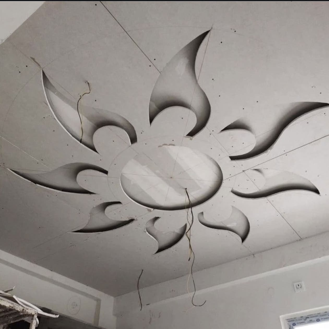 Efficient gypsum board installation in compact space with multi-functional framework and storage integration