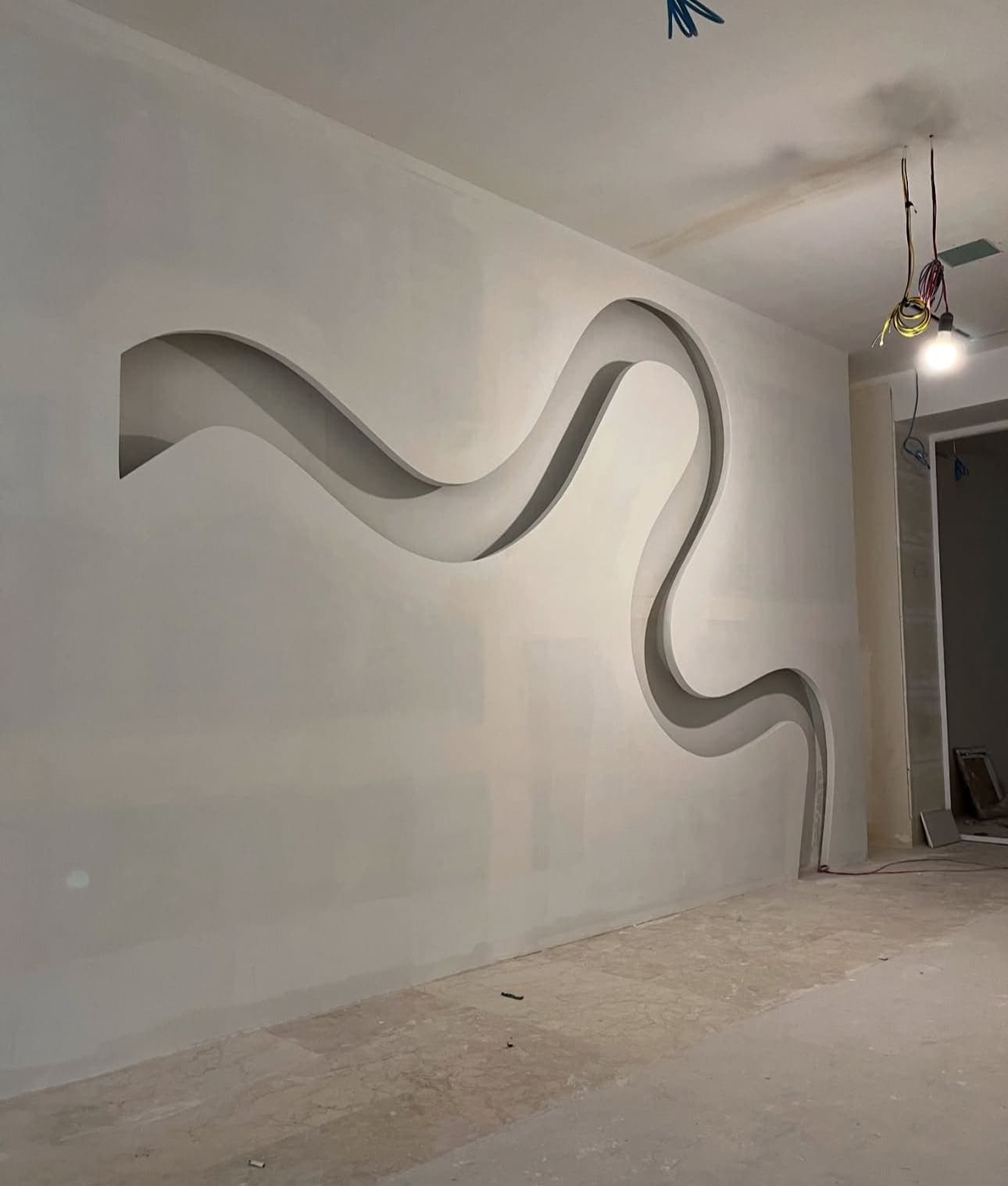 Professional gypsum board wall installation with clean lines and smooth surface preparation