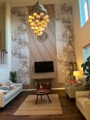 Thumbnail: Gypsum board installation around exposed structural elements with industrial finishing