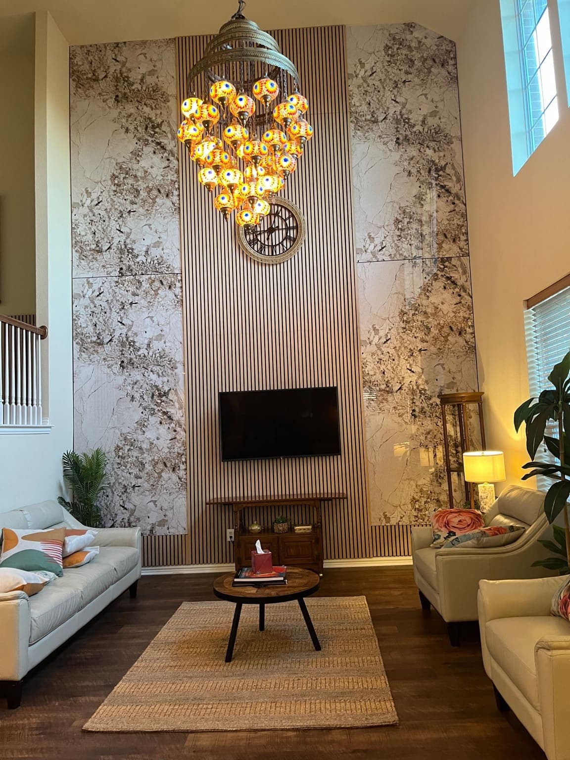 Gypsum board installation around exposed structural elements with industrial finishing