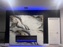 Thumbnail: Gypsum board installation around exposed structural beams with precise cutting and fitting
