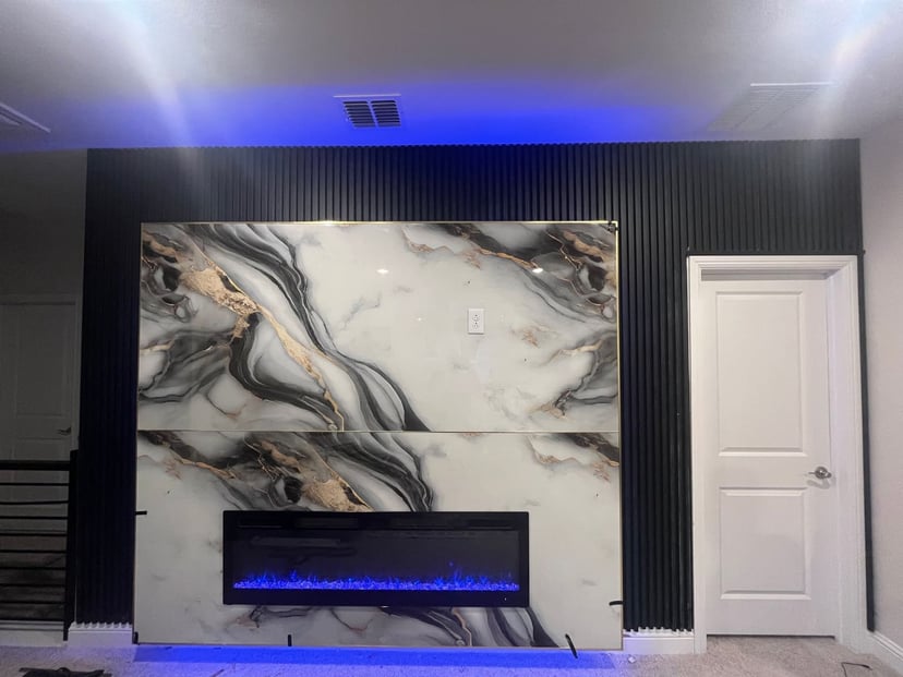 Gypsum board installation around exposed structural beams with precise cutting and fitting